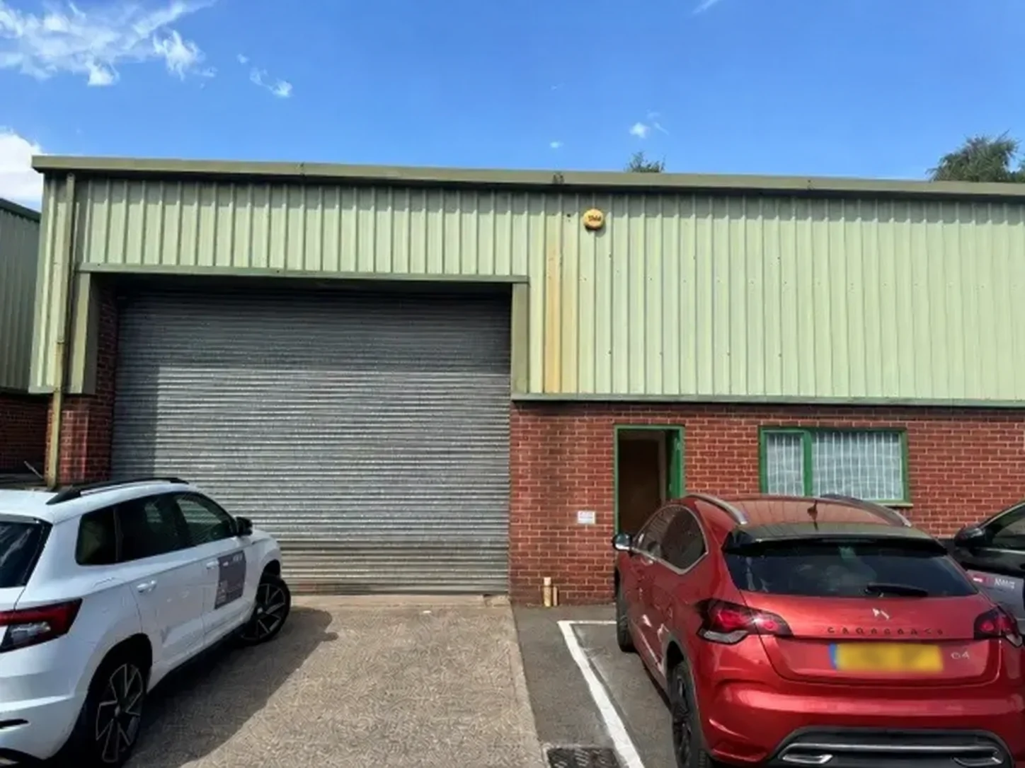 Commercial workshop unit before external refurbishment in Burton-on-Trent